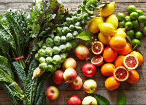 a group of fruits and vegetables on a wood surface Healthy Weight Loss Diets Bloxwich
